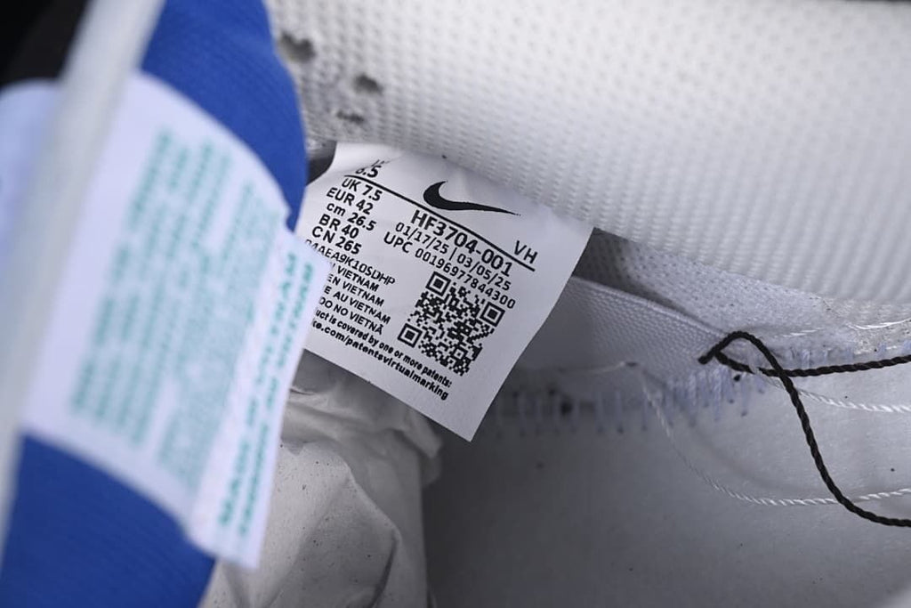 Inside shoe size label showing style HF3704-001 and sample size EU 42.