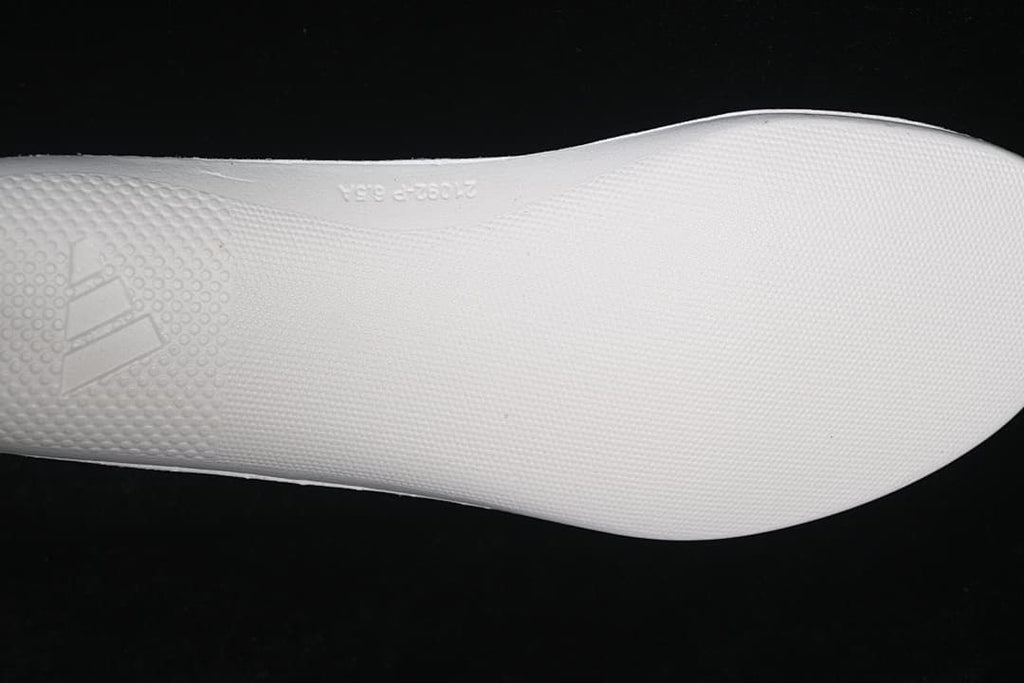 Close-up of the white textured shoe outsole