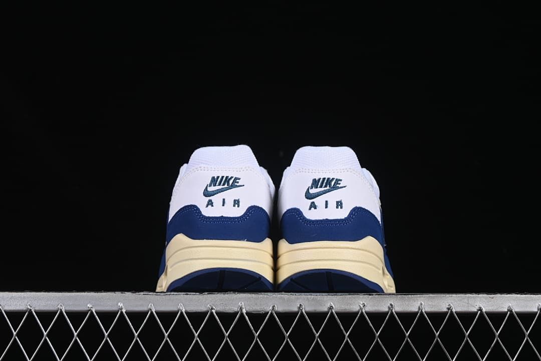 Rear view of both shoes with Nike Air heel details