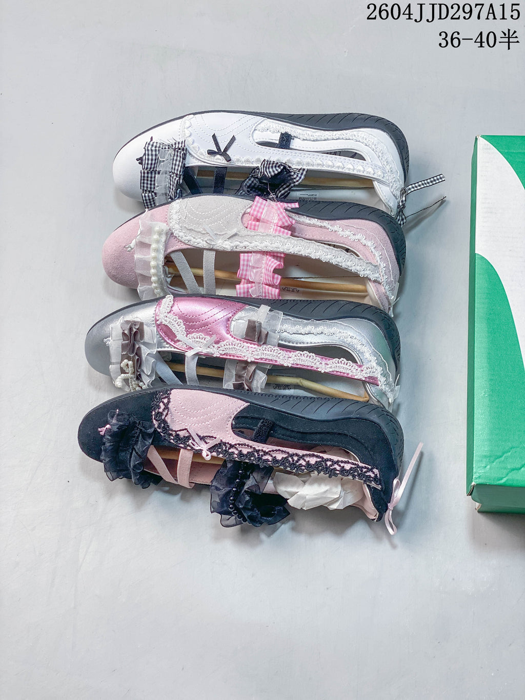 Four embellished low-profile sneaker colorways shown together