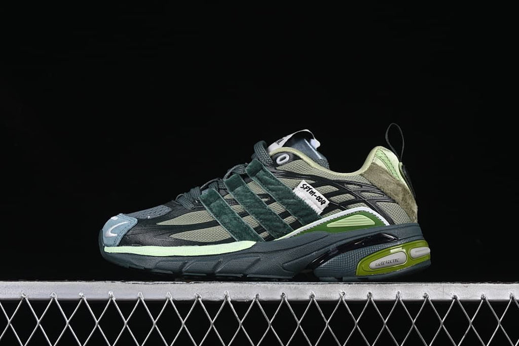 Side view of the adidas Adistar Cushion JH9008 in dark gray, green, and pale lime.