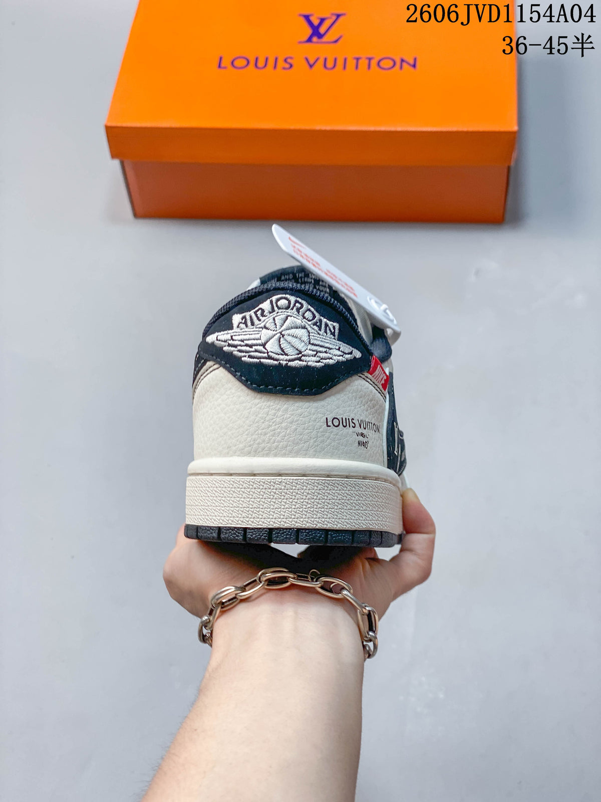 Rear view showing the heel panel and embroidered wing-style logo on the low-top sneaker.