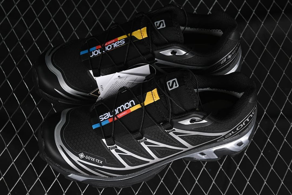 Pair of black and silver Salomon XT-6 GTX shoes shown from above.
