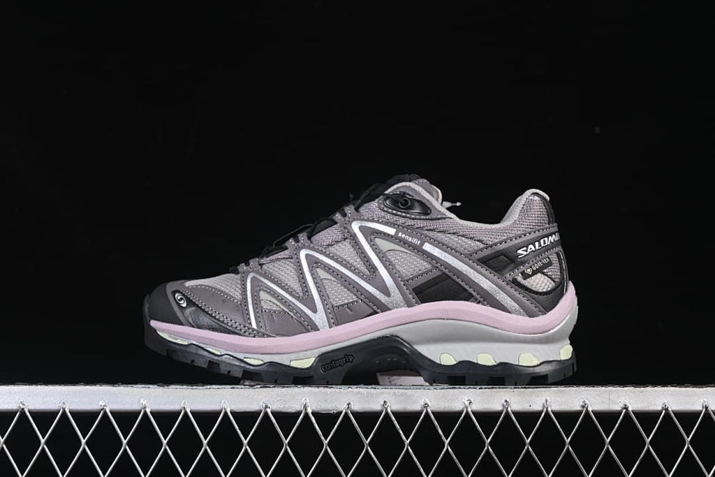 Side profile of the grey Salomon XT-Quest trail shoe