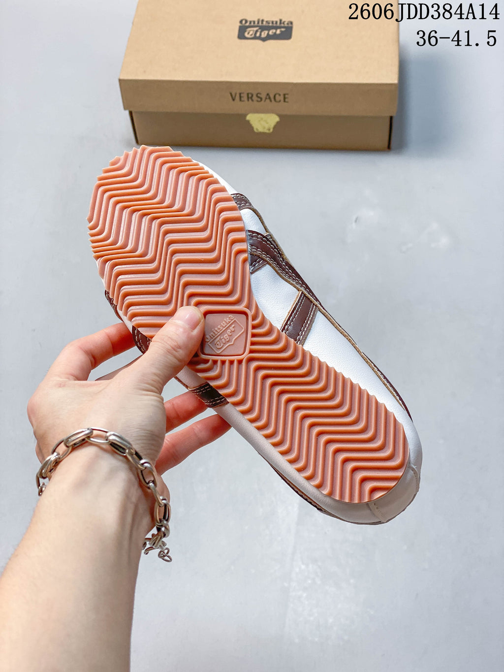 Close-up of the sneaker's gum-colored outsole with ridged tread