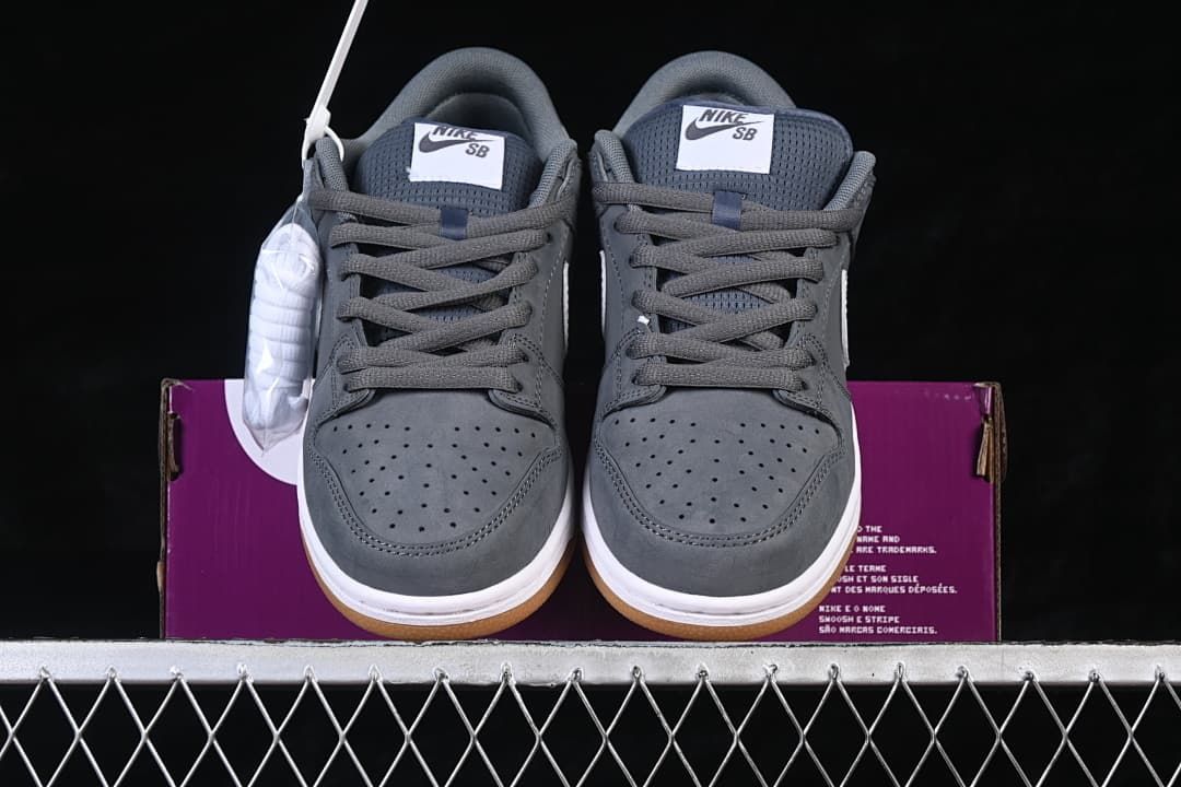 Front view of the pair showing the perforated toes, gray laces, and tongue labels.
