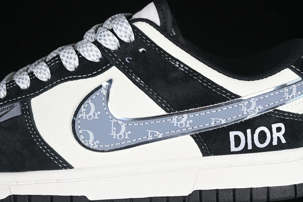 Close-up of the gray patterned swoosh, black overlays, and side branding.