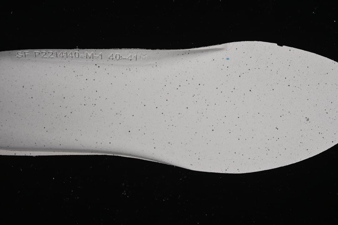 Close-up of the shoe insole with a stamped size marking.