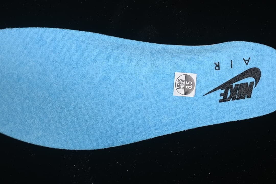 Blue insole with a visible men's size 8.5 label