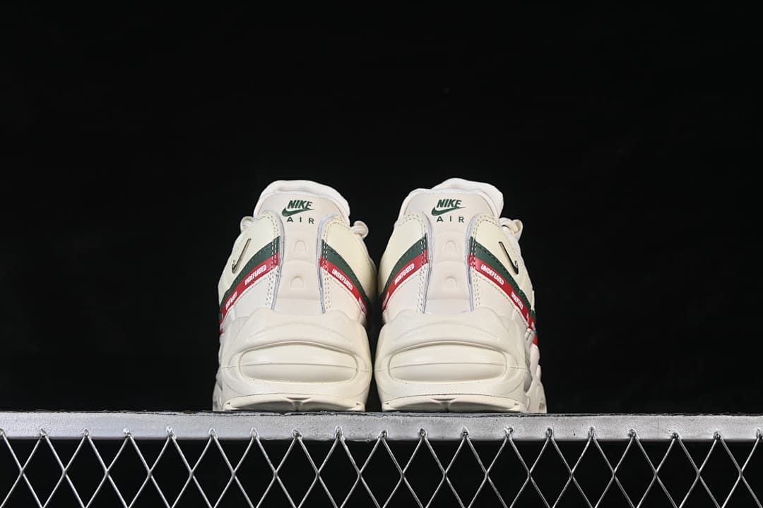 Rear view of both shoes, showing heel panels and visible Air units.