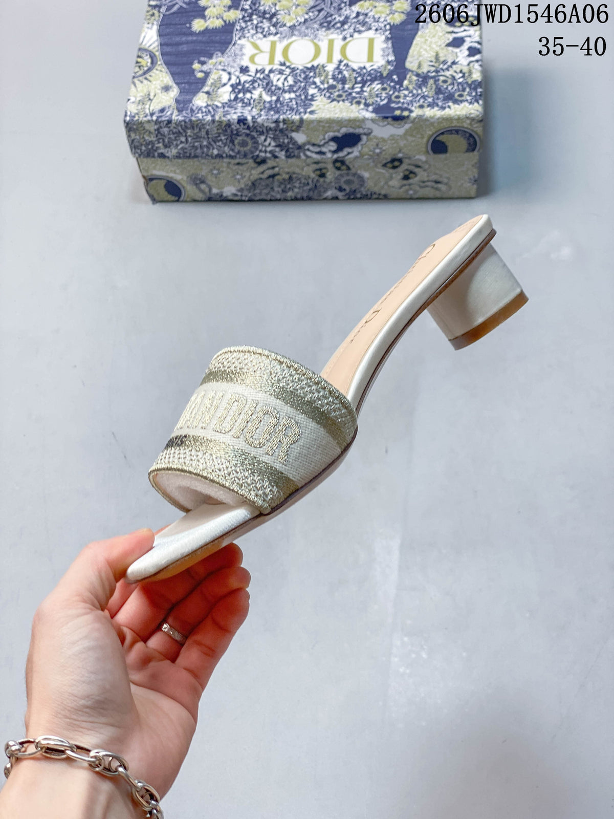 Side profile showing the embroidered strap, square toe, and heel