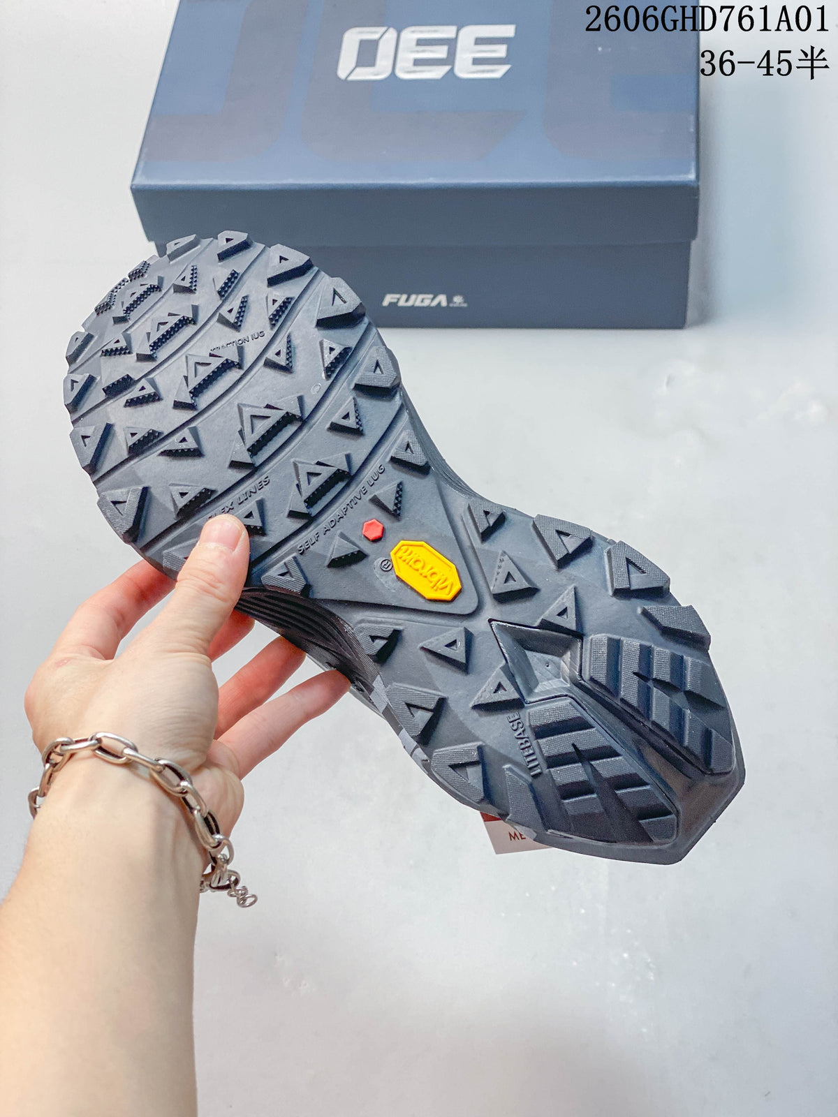 Close-up of the trail shoe outsole showing its deep, varied lugs