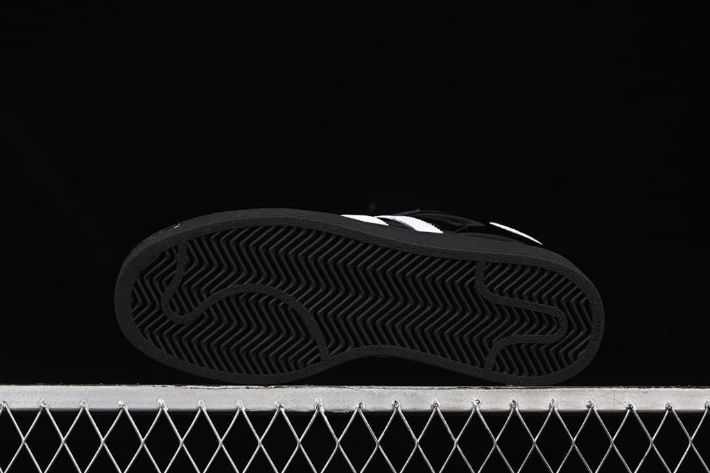 Underside view showing the patterned black outsoles