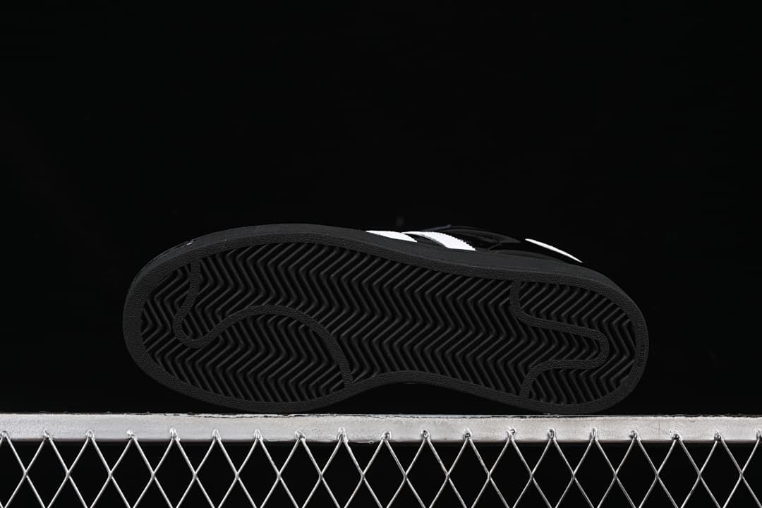 Underside view showing the patterned black outsoles