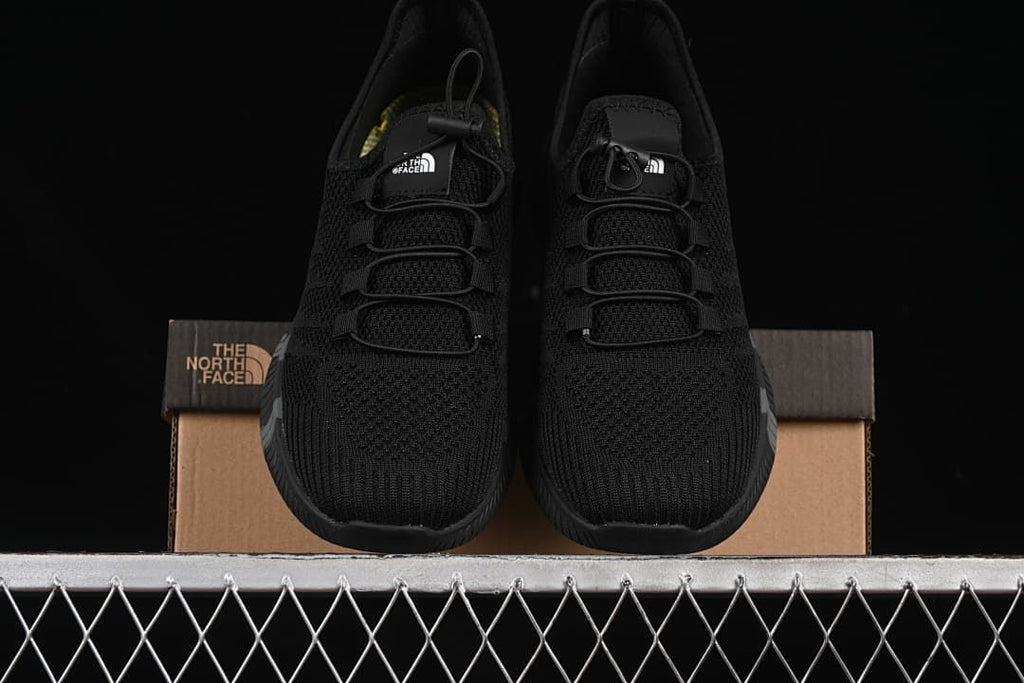 Front view of the pair resting on the shoe box