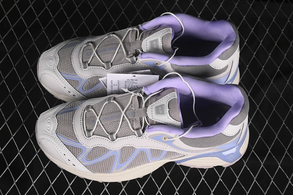 Pair of Salomon XT-Whisper shoes shown from above and the side.