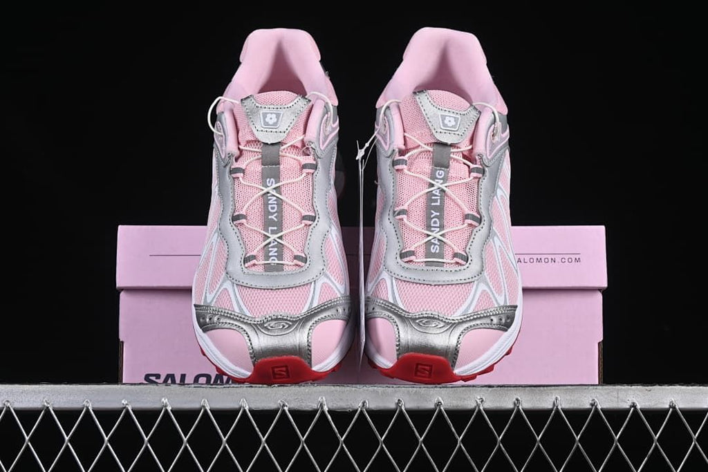 Front view of the pair resting on a pink shoe box