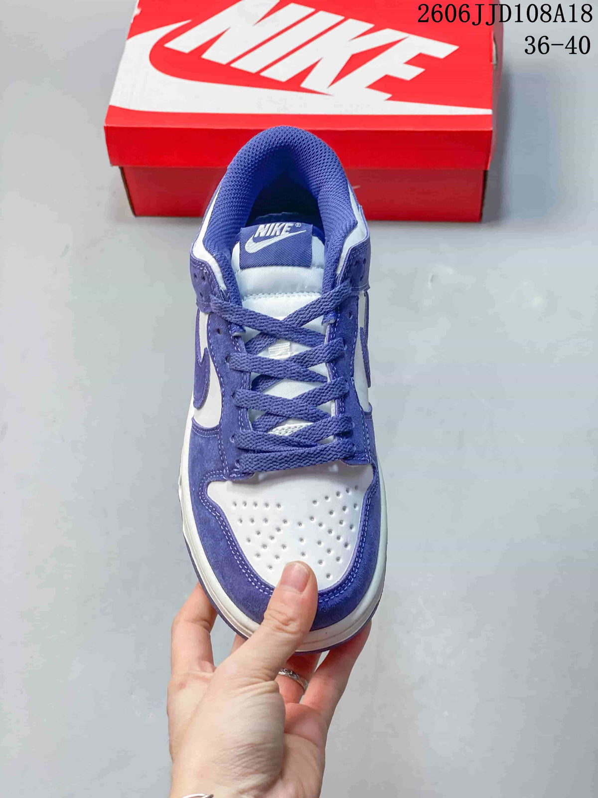 Top view showing the perforated toe box and purple laces.