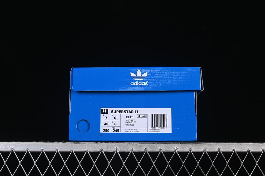 Blue adidas shoe box label identifying Superstar II, model KJ6981, and the photographed size.
