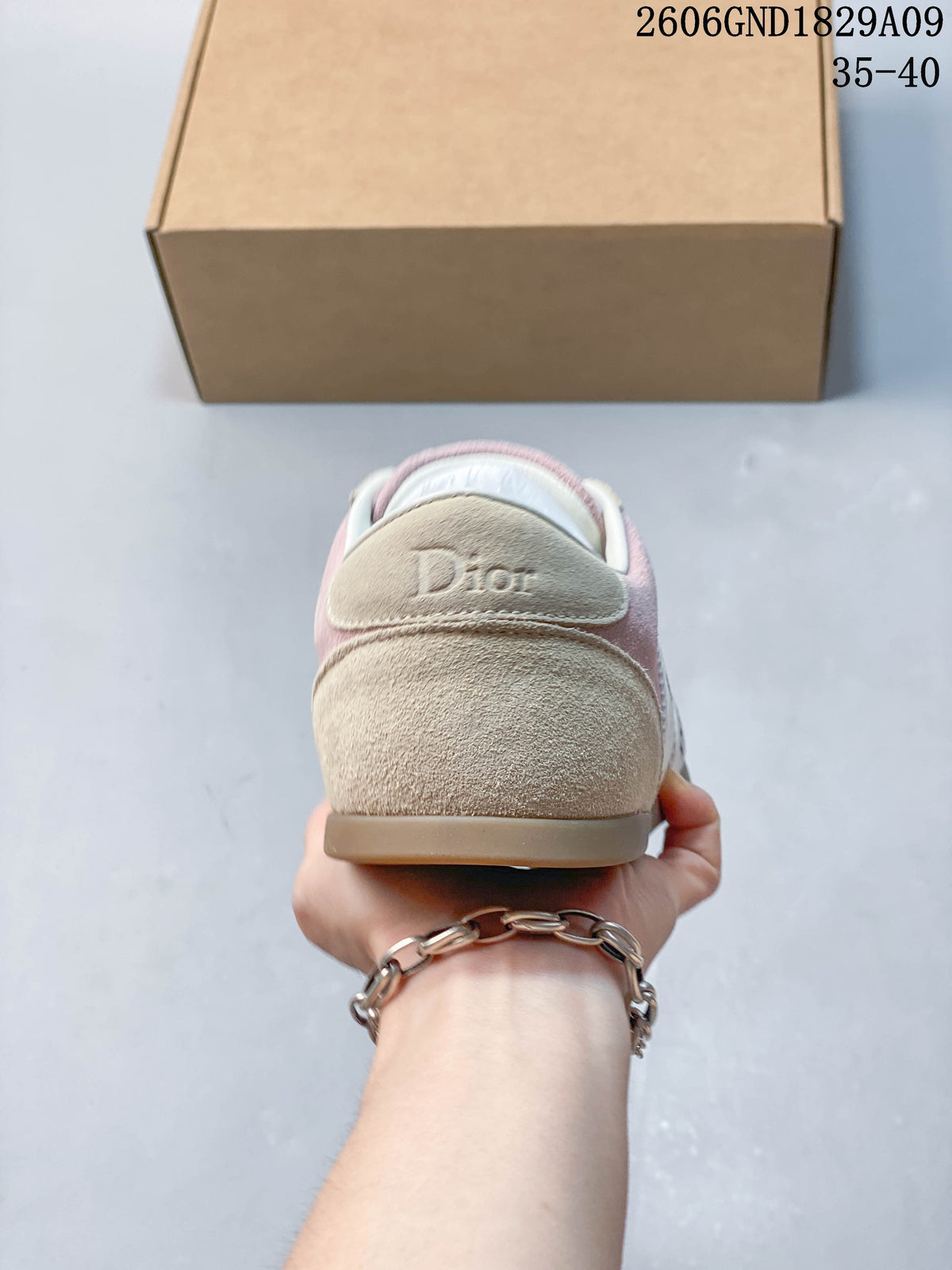 Rear view of the sneaker with Dior lettering on the heel