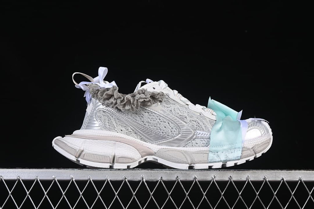 Side profile highlighting the layered upper and sculpted sole