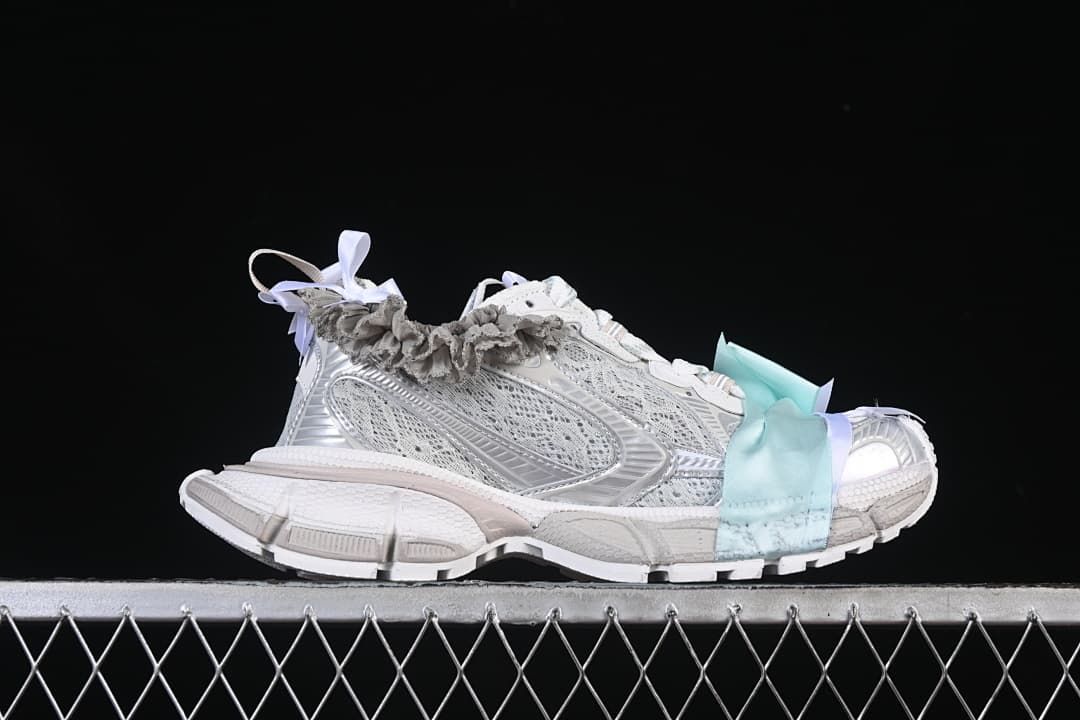 Side profile highlighting the layered upper and sculpted sole
