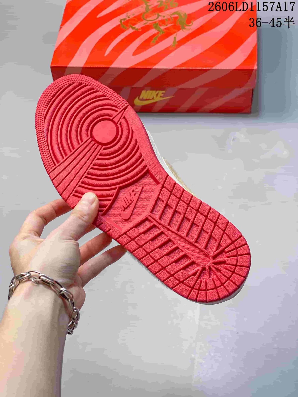 Red outsole with circular traction pattern