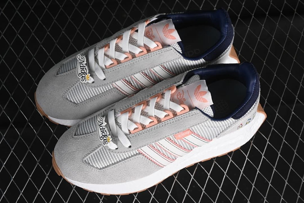 Pair of gray Retropy E5 sneakers photographed from above