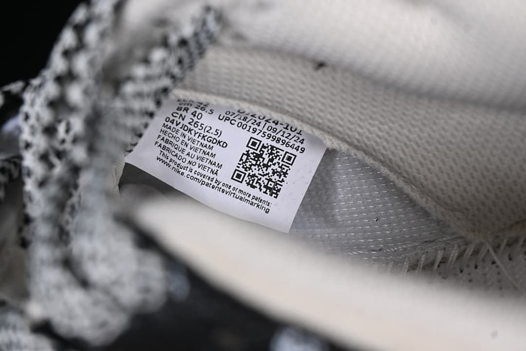 Close-up of the inner size label inside the sneaker.