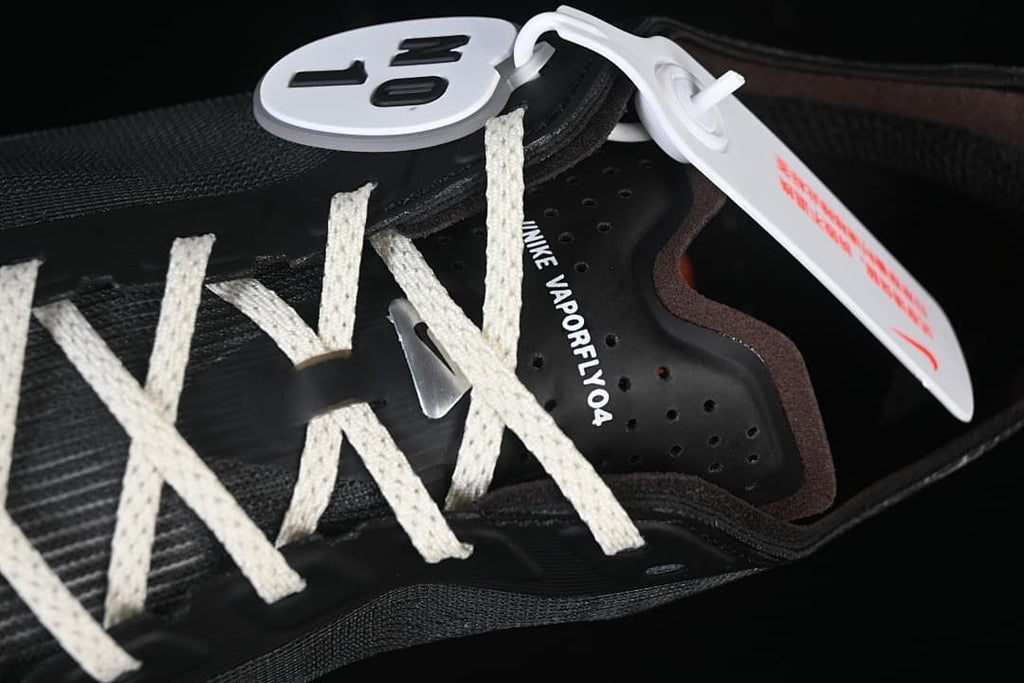 Close-up of the laces, tongue, and visible Vaporfly branding.