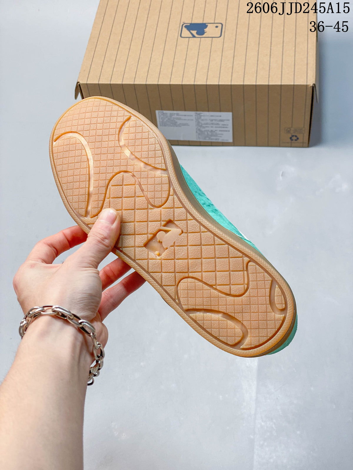 Close-up of the gum-colored sneaker outsole and its patterned tread.
