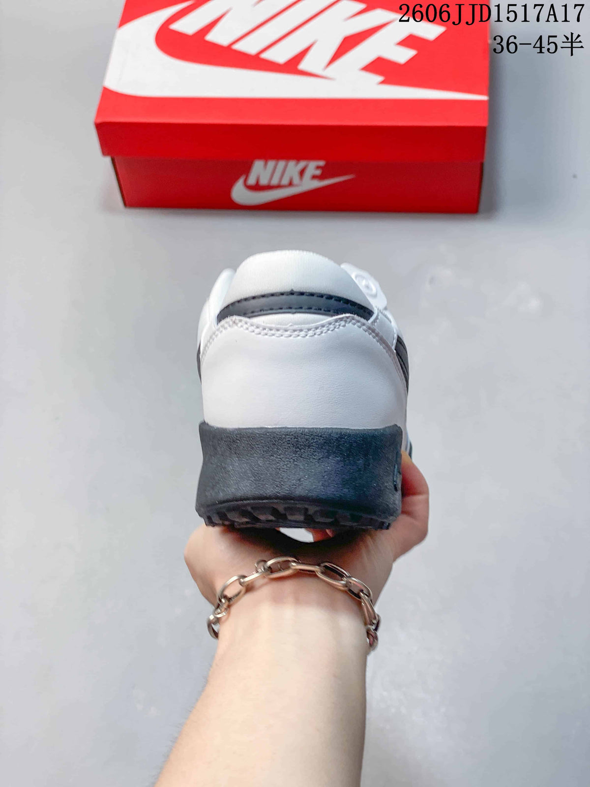 Rear view of the white Nike Terra Manta sneaker with a dark gray heel and outsole.
