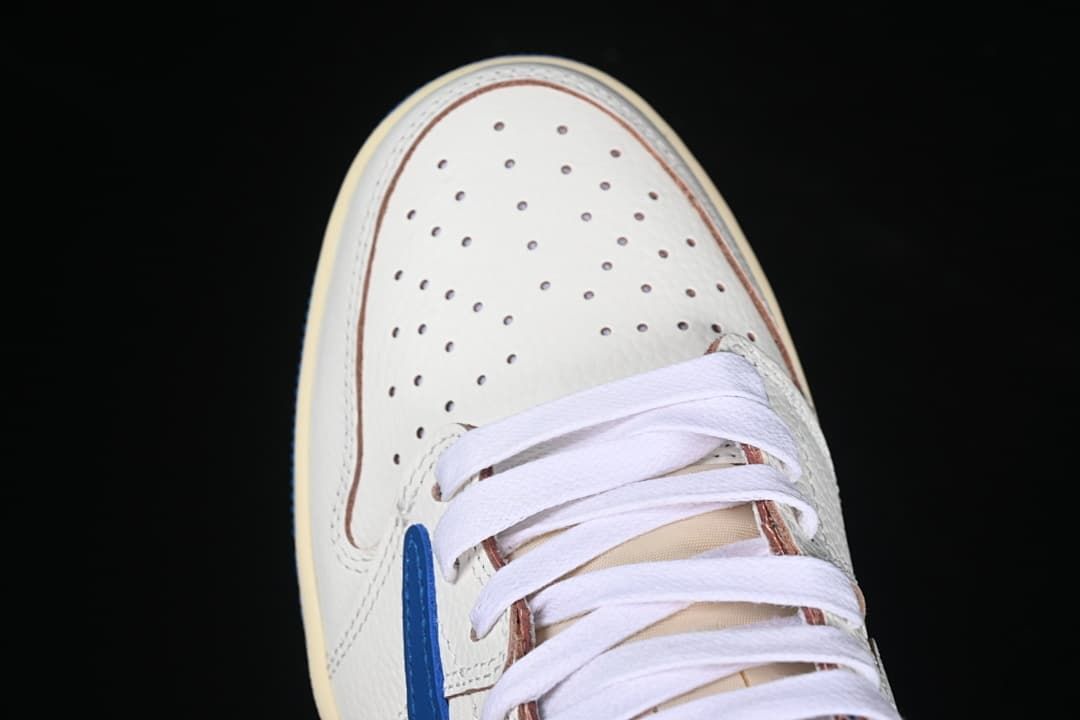 Top view of the perforated toe and white laces
