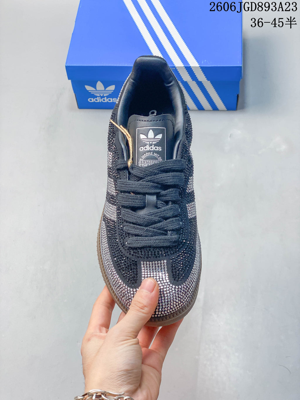 Top view of the lace-up sneaker with embellished toe and tongue