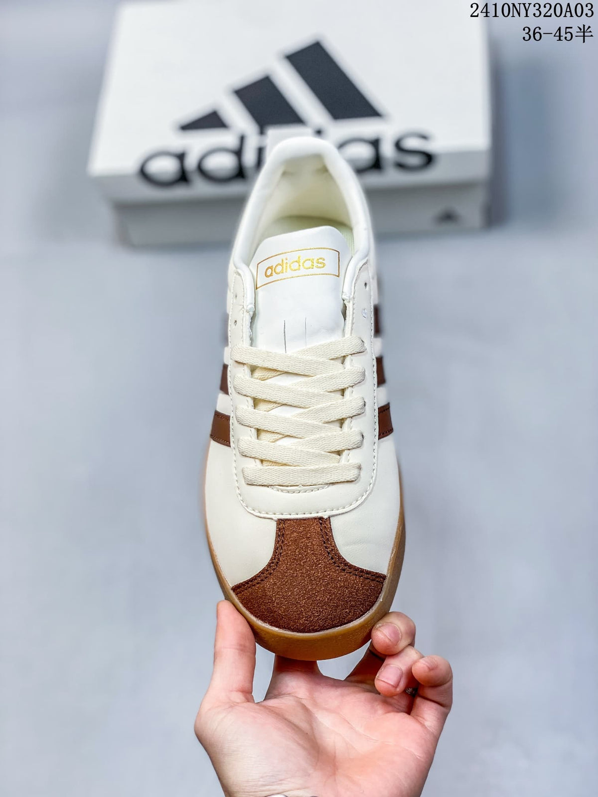 Top view of the lace-up sneaker showing its brown toe accent