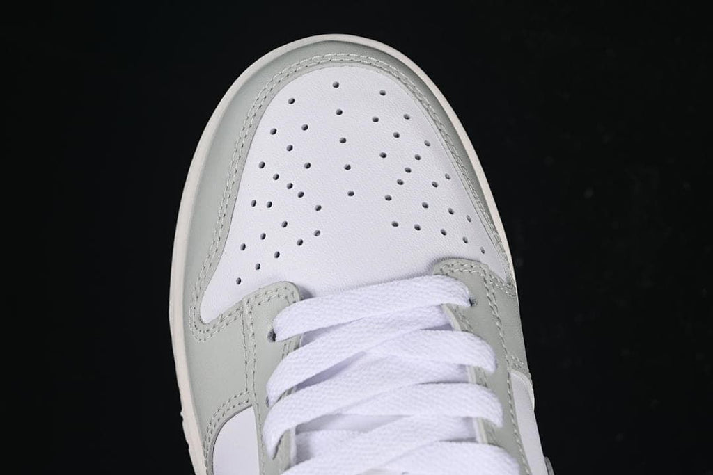 Top view of the perforated toe and laces