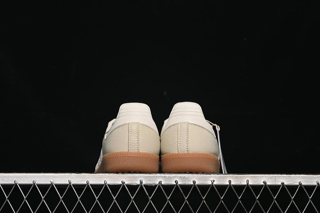 Rear view of the pair showing heel panels and gum-look soles.