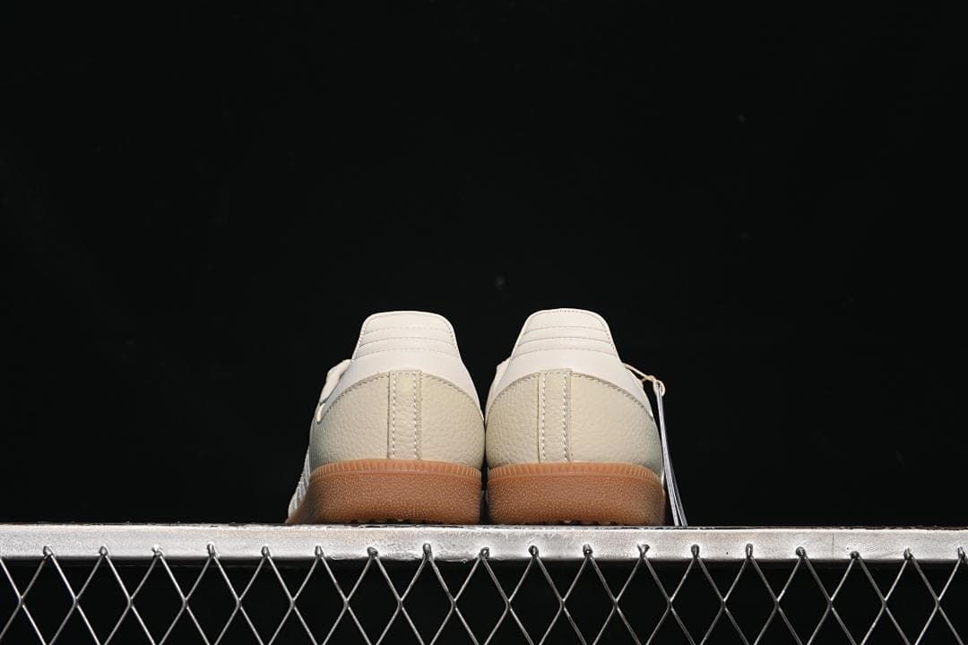 Rear view of the pair showing heel panels and gum-look soles.