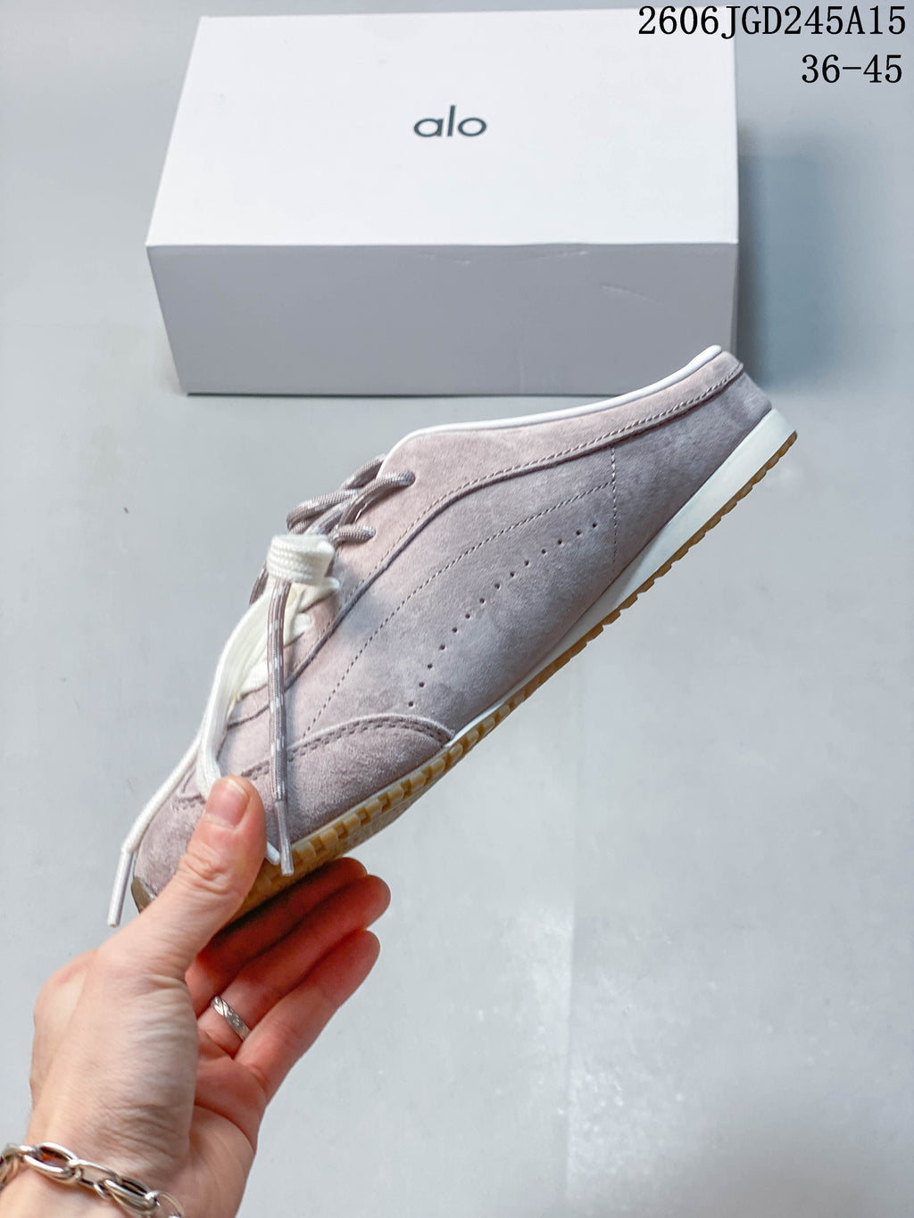 Side view of the mauve-taupe lace-up sneaker