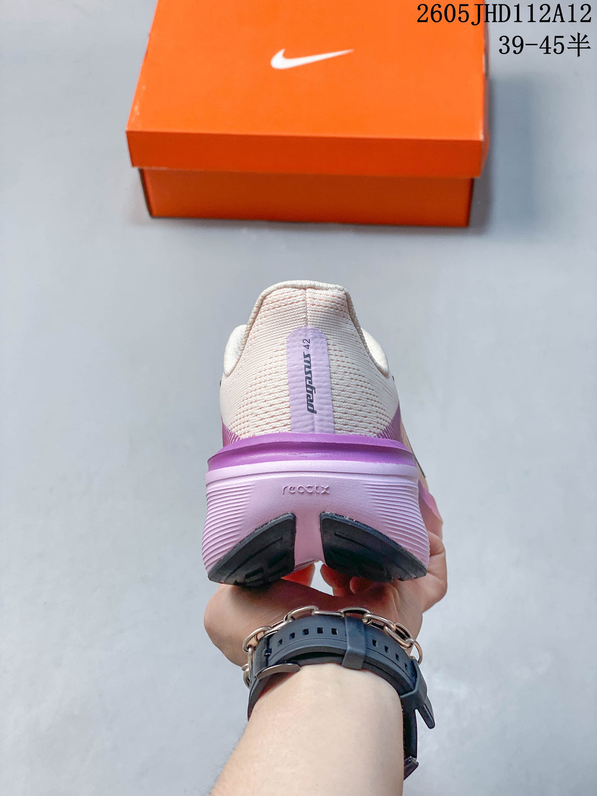 Rear view of the shoe showing a purple heel section and padded collar.