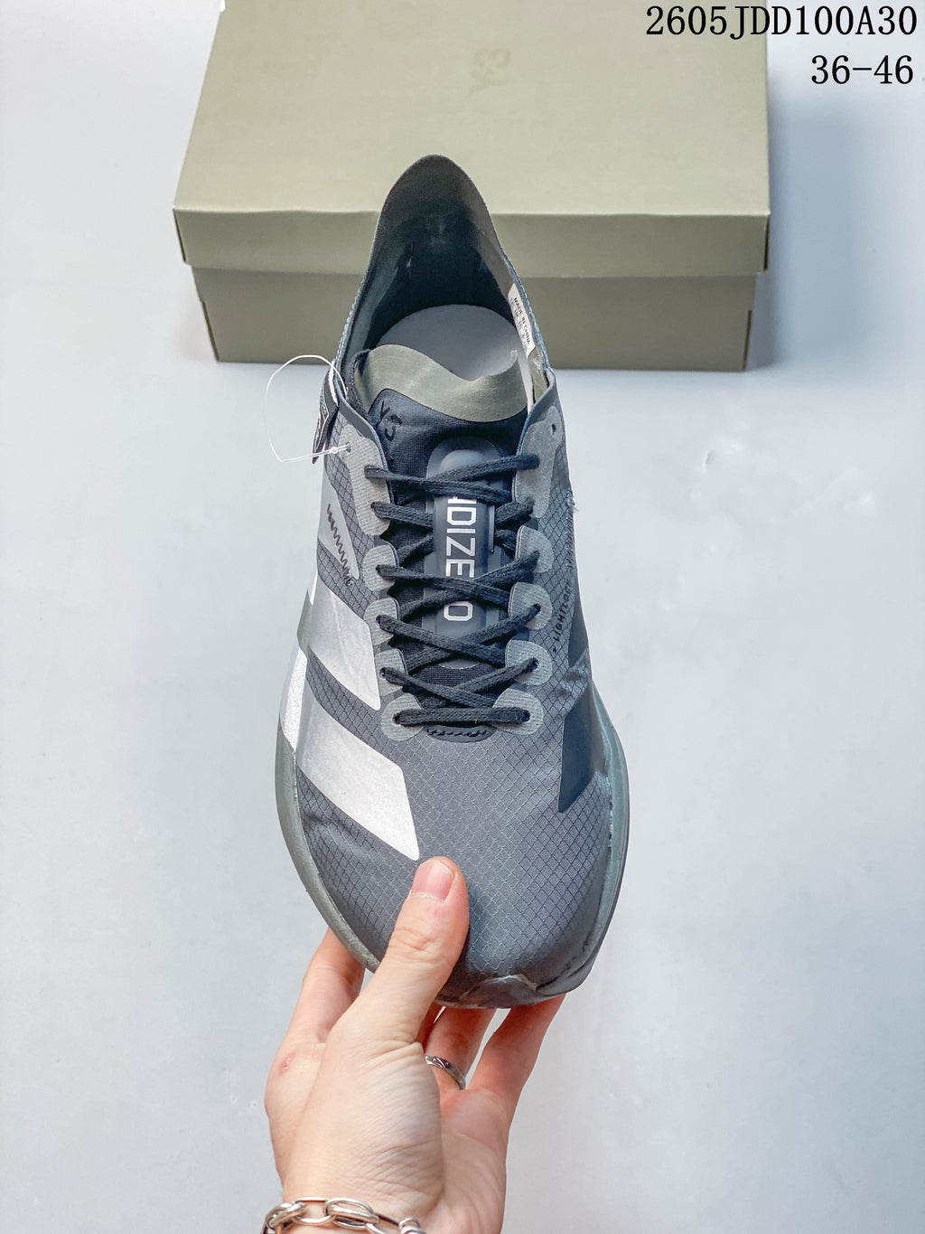 Top view of the gray lace-up running shoe.