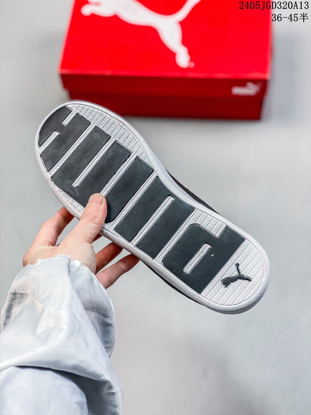 Close-up of the sneaker outsole with dark segmented tread