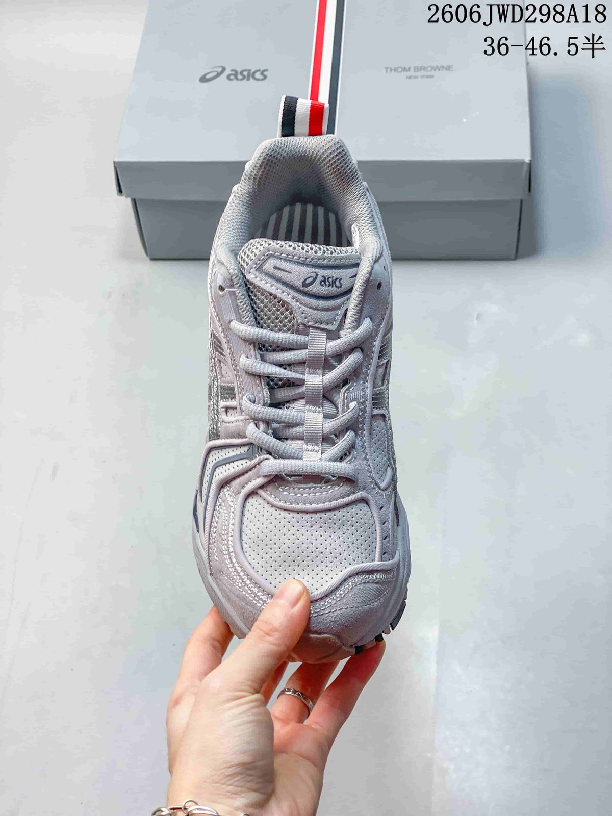 Front view highlighting the laces and perforated toe panel.