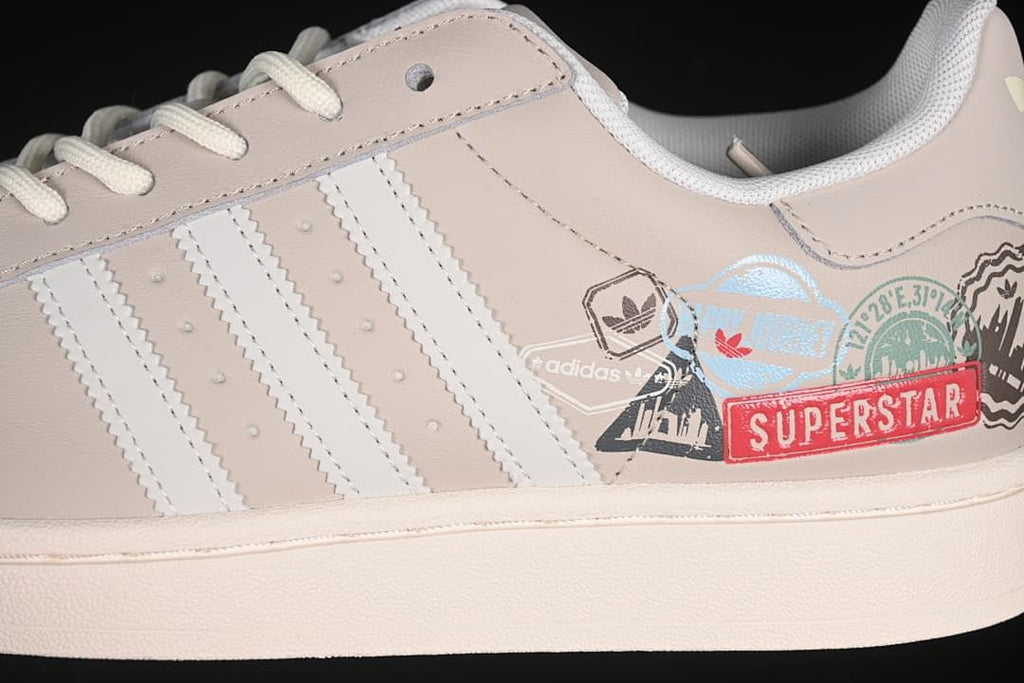 Close-up of the white stripes and colorful printed graphics on the beige side panel.