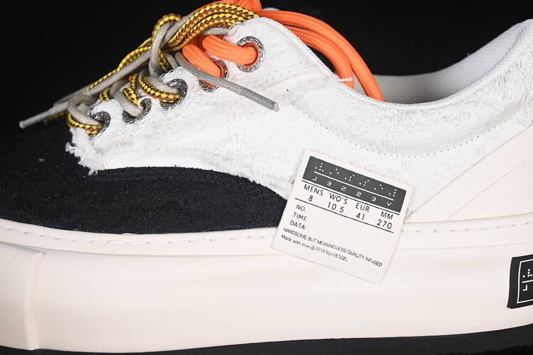 Close-up of the upper, metal eyelets, and contrasting laces