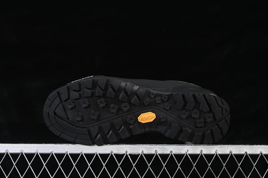 Underside of the shoe showing the tread pattern and Vibram marking
