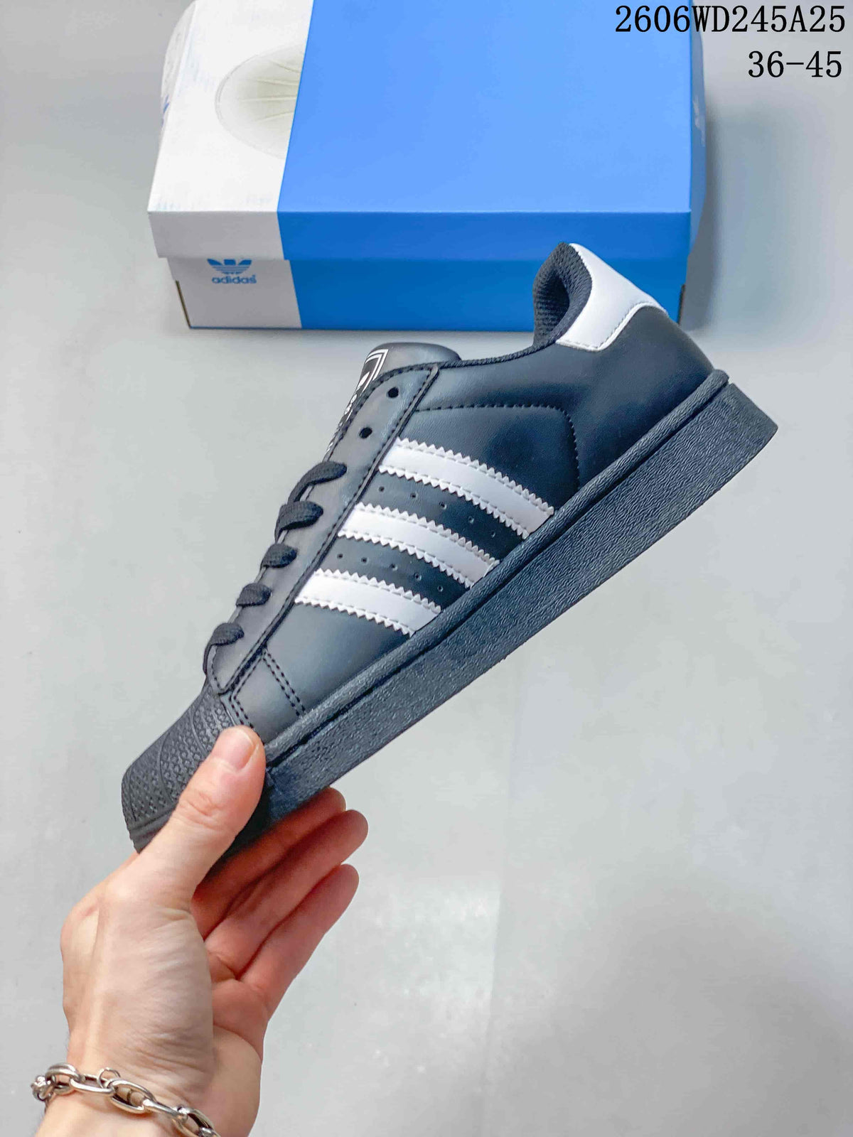 Side profile showing the white stripes and low-top silhouette