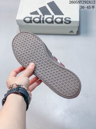 Bottom view of the sneaker showing the textured gum-colored rubber outsole and geometric tread.