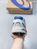 Rear view of the white and blue ASICS sneaker beside its branded shoe box, with a size marking visible on the image.
