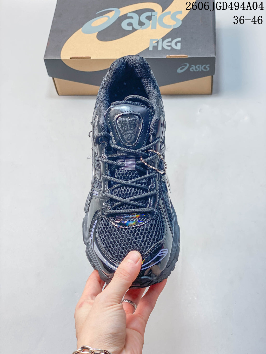 Top view of the sneaker showing its laces and mesh-like toe area